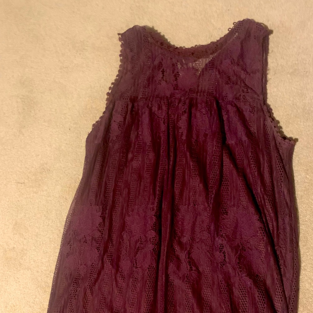 A burgundy color dress